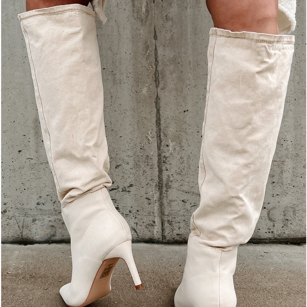 New in box knee high boots